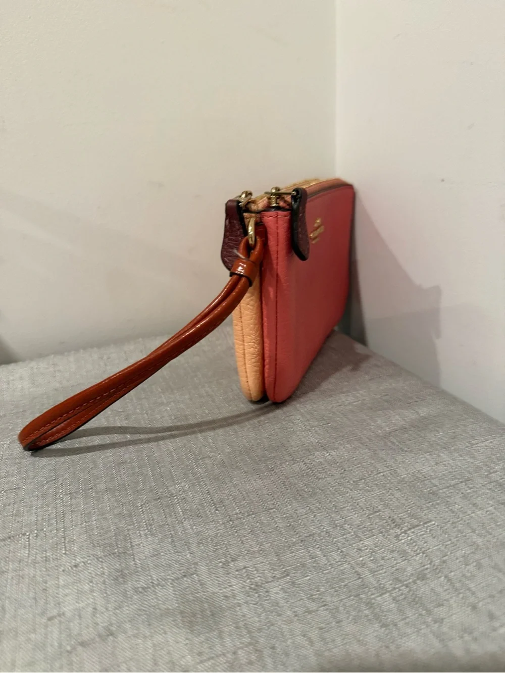 Coach Pink and Peach Two Tone Pebbled Leather Wristlet with Tan Strap